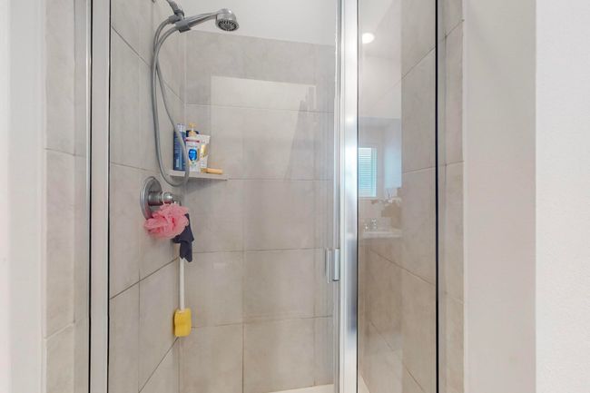 Bathroom with a shower stall | Image 15