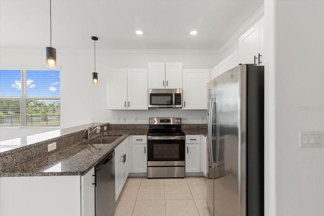 7018 Ripple Pond Loop, Townhouse with 3 bedrooms, 3 bathrooms and null parking in ZEPHYRHILLS FL | Image 13