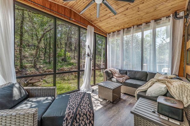 Sunroom / solarium featuring an outdoor hangout area and ceiling fan | Image 9