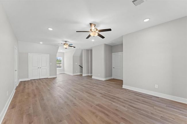 Massive game room upstairs with balcony access and room to entertain. | Image 27