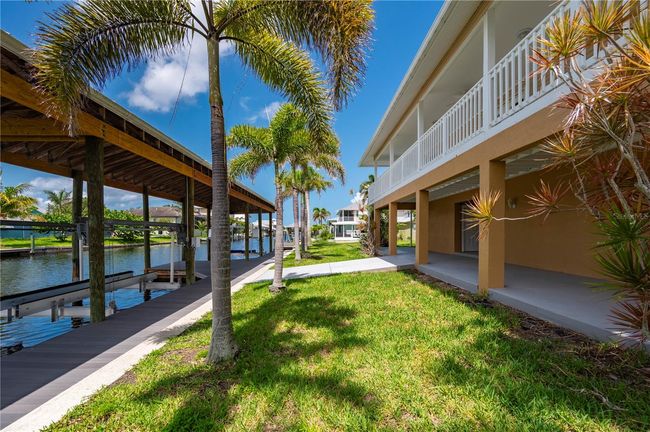 24261 Captain Kidd Blvd, House other with 3 bedrooms, 3 bathrooms and null parking in PUNTA GORDA FL | Image 45
