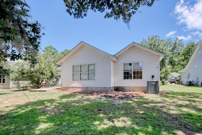 Back of house with a yard | Image 4