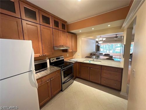 a209-1018 Woodshire Ln, NAPLES, FL, 34105-7432 | Card Image