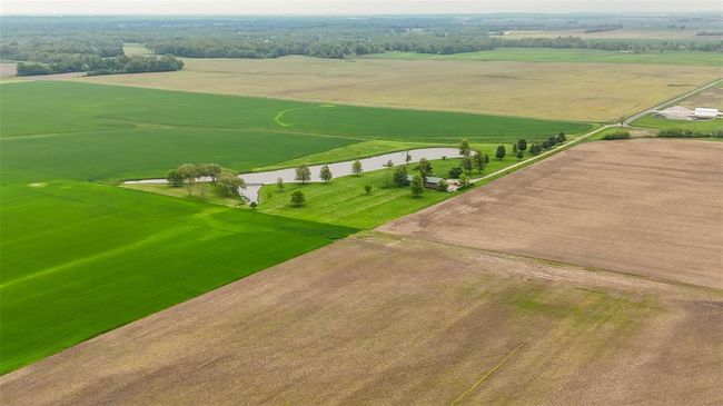 View of rural area featuring a nearby body of water | Image 24