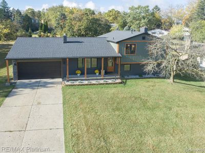 11351 Manchester Drive, Home with 4 bedrooms, 2 bathrooms and null parking in Tyrone Twp MI | Image 2