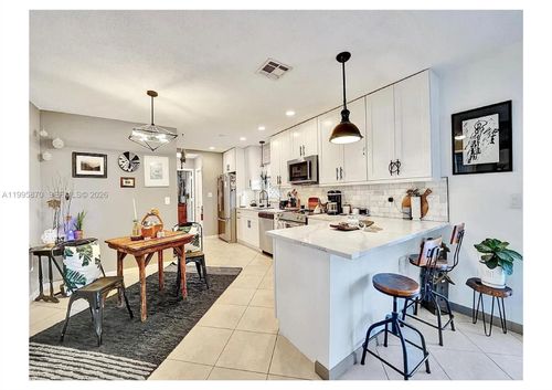 381 Ne 42nd St, Oakland Park, FL, 33334-1406 | Card Image