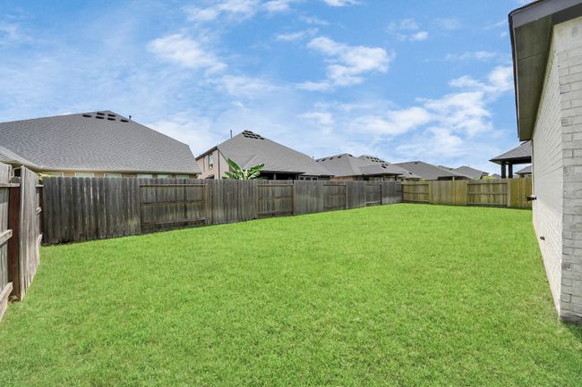 Private backyard with plenty of space for kids, pets, or future pool | Image 41