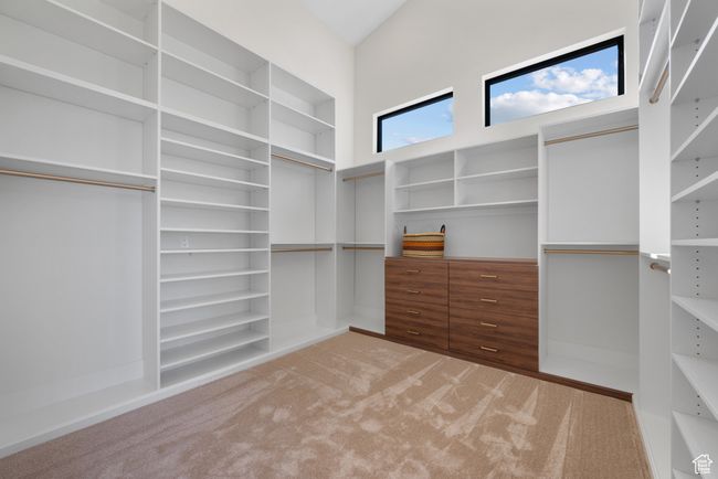 Spacious closet with light colored carpet | Image 45