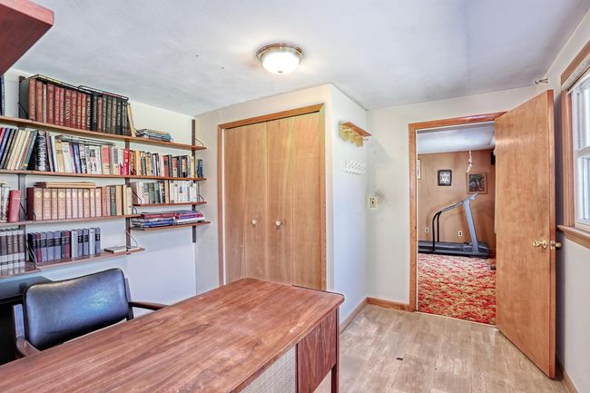 Office area with baseboards and wood finished floors | Image 27