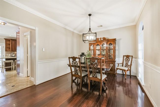 Dining room is conveniently located off the kitchen. | Image 18