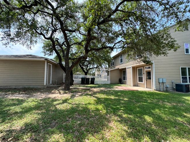 View of yard featuring central air condition unit and a patio area | Image 38