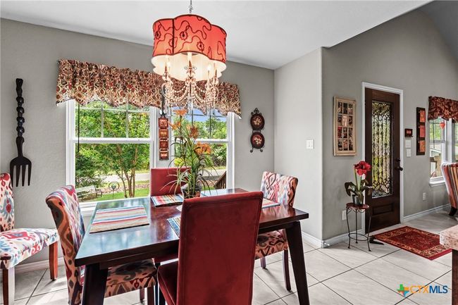 Kitchen window looking out to front yard | Image 18