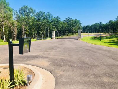 View of home's community featuring a yard | Image 2