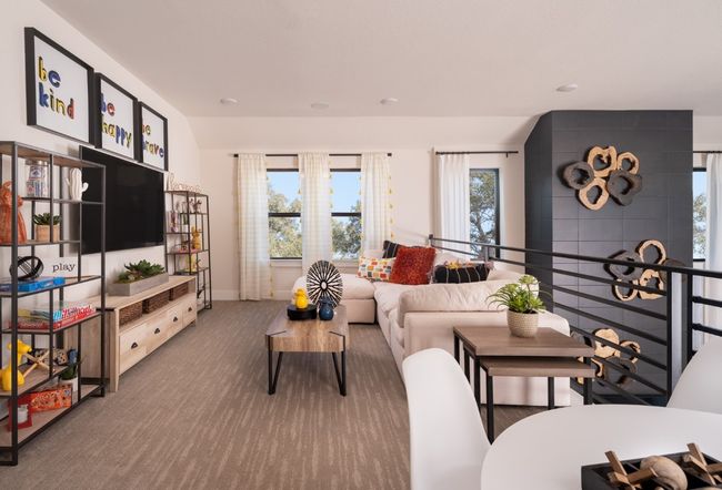 Carpeted living area with plenty of natural light | Image 10