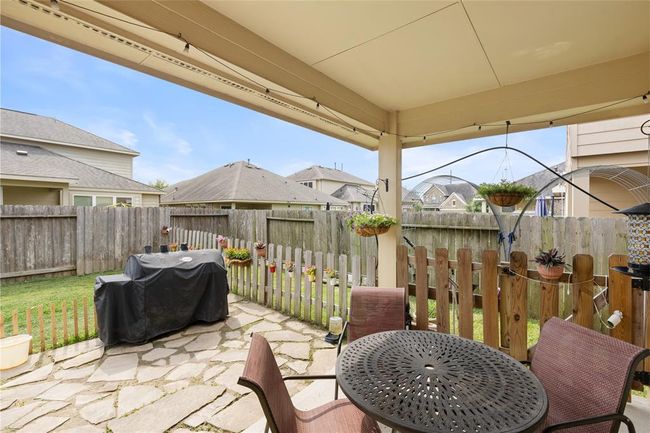 Large covered patio in the backyard | Image 30