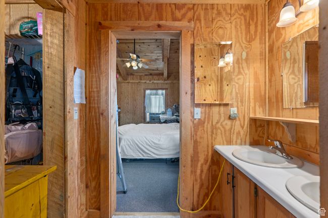 Bathroom wood walls, and double vanity | Image 18