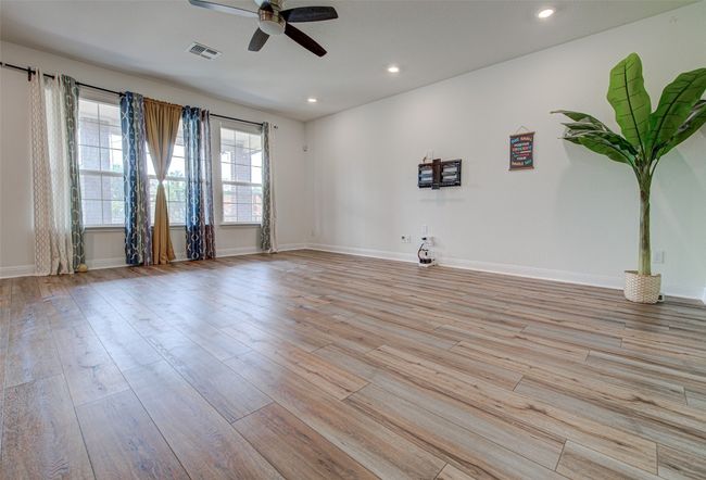 Formal Dining Room with arched wall, recessed lights & decorative chandelier - First Floor | Image 7