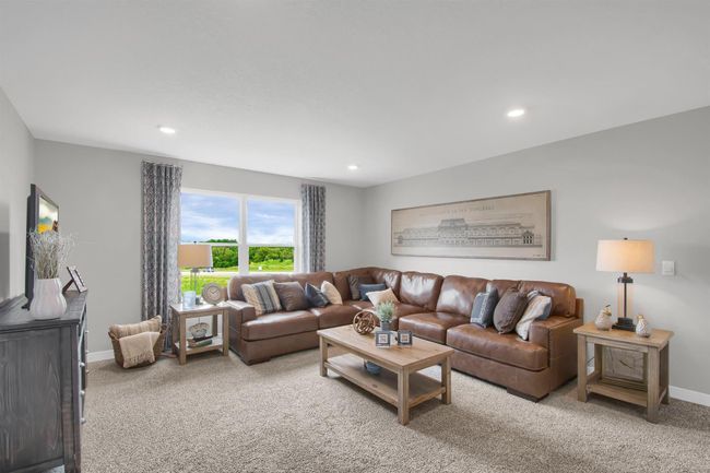 The upper level loft is a great space to unwind, read books or watch TV. Model photos. Options and colors will vary. | Image 18