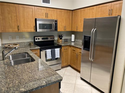 303-6400 Emerald Dunes Dr, West Palm Beach, FL, 33411-2758 | Card Image