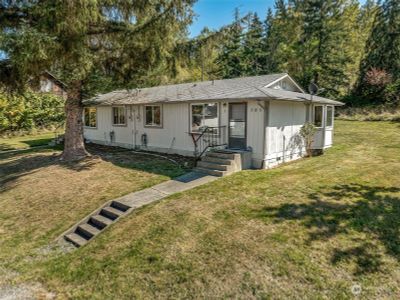 Opportunity awaits! 2 unit duplex on a half acre lot in Eatonville is ready for its next investor! | Image 1