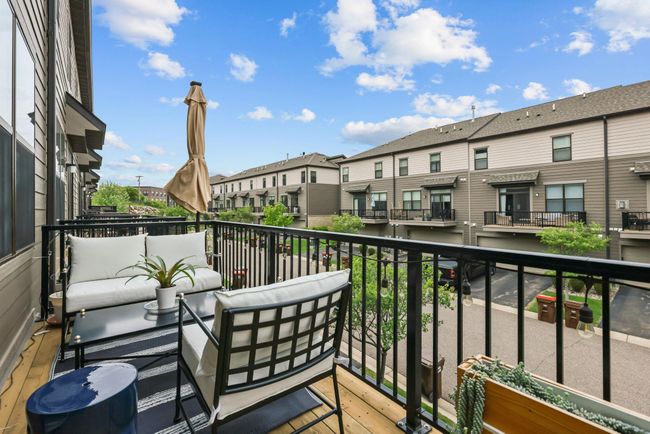 This unit features a deck off the kitchen - family room area. Enjoy the afternoon sun! | Image 18