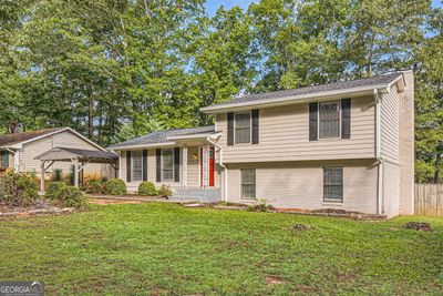 139 Old Mill Trail Sw, House other with 3 bedrooms, 2 bathrooms and 2 parking in Conyers GA | Image 3