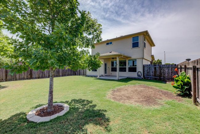 Large backyard with mature trees and no neighboring houses behind. | Image 32