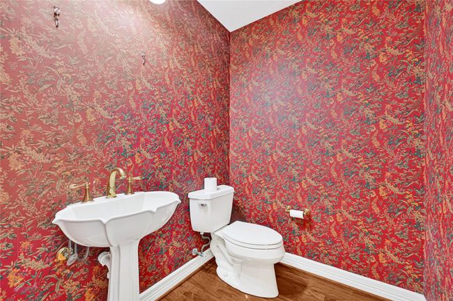 Convenient half bath adjacent to the office. | Image 16