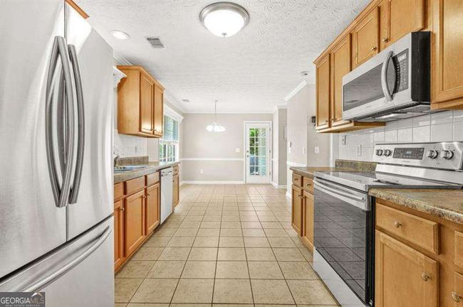 182 Garden Manor Ct, House other with 3 bedrooms, 3 bathrooms and 2 parking in Loganville GA | Image 11