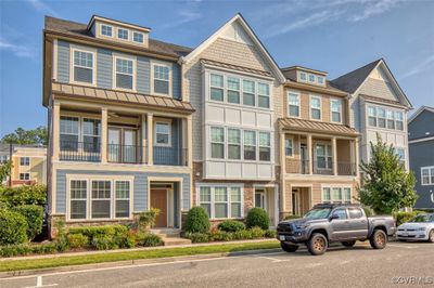 Townhome / multi-family property featuring a balcony | Image 2