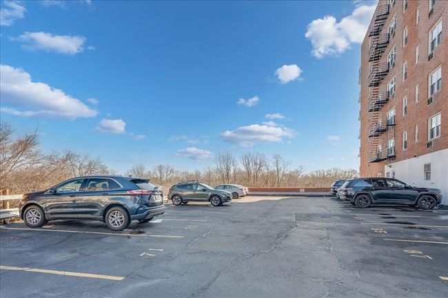 View of uncovered parking lot | Image 23