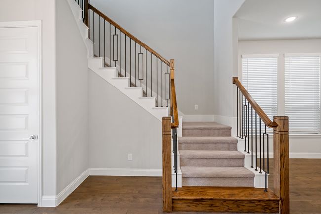 Staircase with baseboards, wood finished floors, and recessed lighting | Image 4