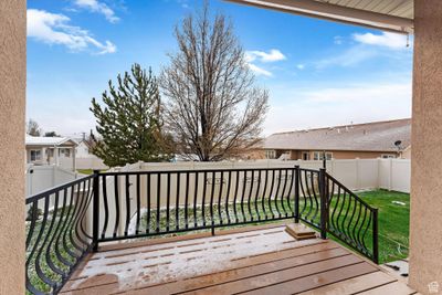 Wooden terrace with a lawn | Image 2