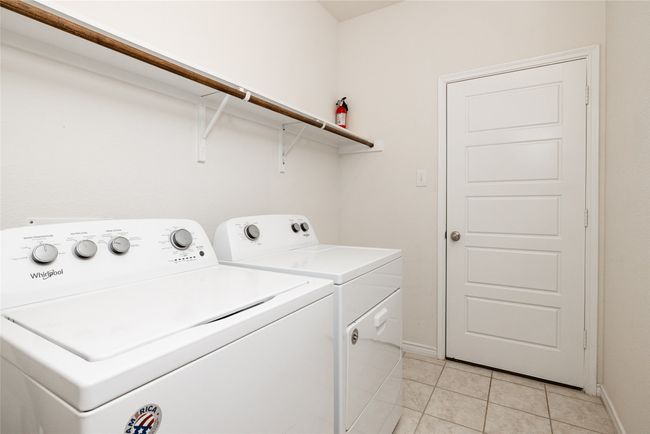 Hanging rod in laundry room | Image 18