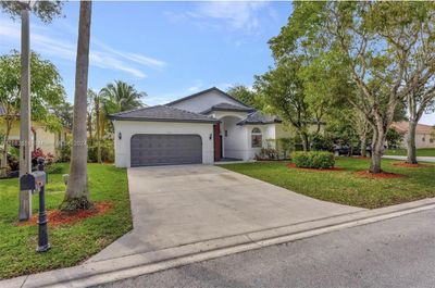 5776 Nw 56th Mnr, House other with 3 bedrooms, 2 bathrooms and null parking in Coral Springs FL | Image 1