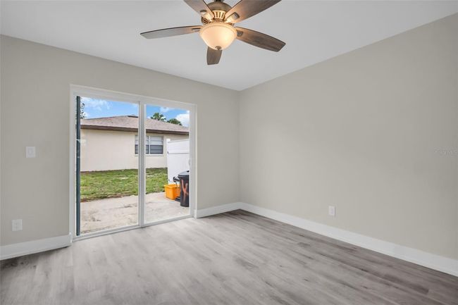 Bedroom with Slider to patio | Image 10