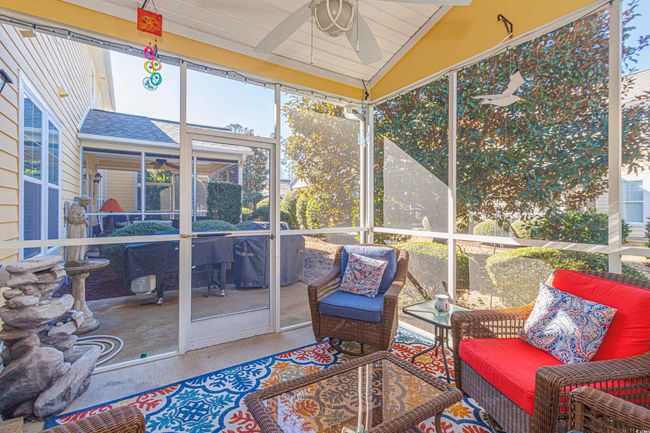 Sunroom with lofted ceiling and ceiling fan | Image 31