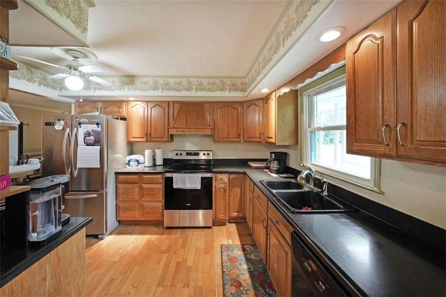 6880 Mark Turner Rd, House other with 3 bedrooms, 3 bathrooms and 8 parking in Lithia springs GA | Image 4