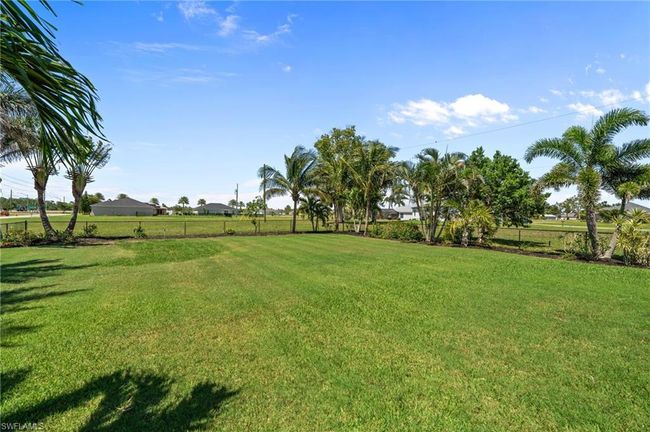 Fenced in Adjacent lot with landscaping & irrigation | Image 46