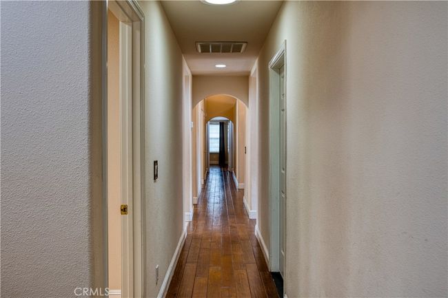 Hallway to Primary and 2 guest rooms | Image 19