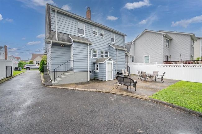 Rear view of property featuring a patio | Image 4
