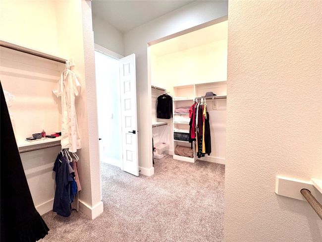 Walk in closet with carpet | Image 24