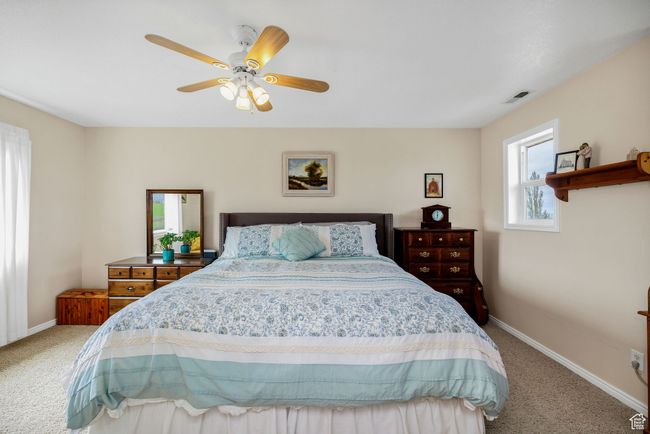 Master Bedroom with carpet floors, baseboards, and ceiling fan | Image 10