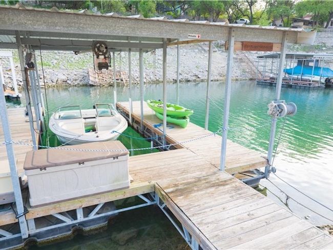 Dock area featuring a water view | Image 4
