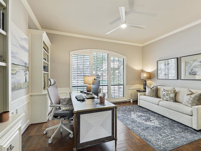 Office space featuring crown molding, ceiling fan, and wainscoting | Image 17
