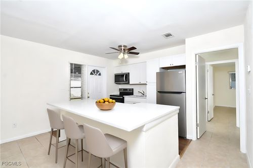 44 Tangelo Ct, LEHIGH ACRES, FL, 33936-7234 | Card Image