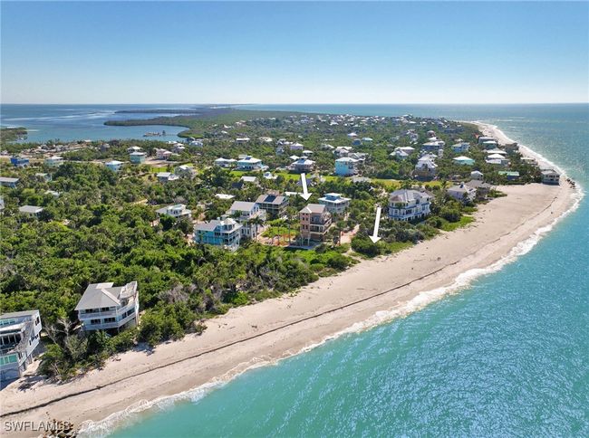 Drone / aerial view with a water view and a view of the beach | Image 20