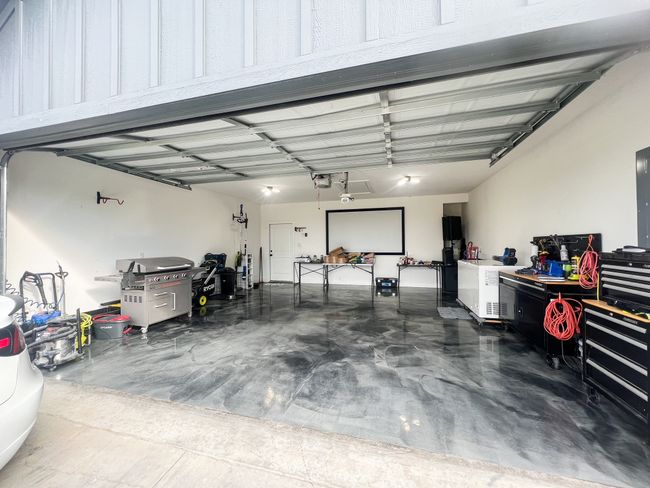 Garage featuring a garage door opener | Image 15