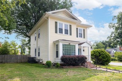 View of front of house featuring central AC and a front lawn | Image 3