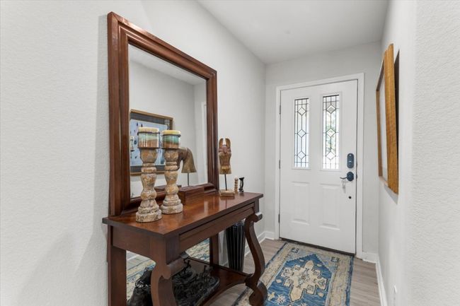 Foyer entrance featuring wood finished floors | Image 11